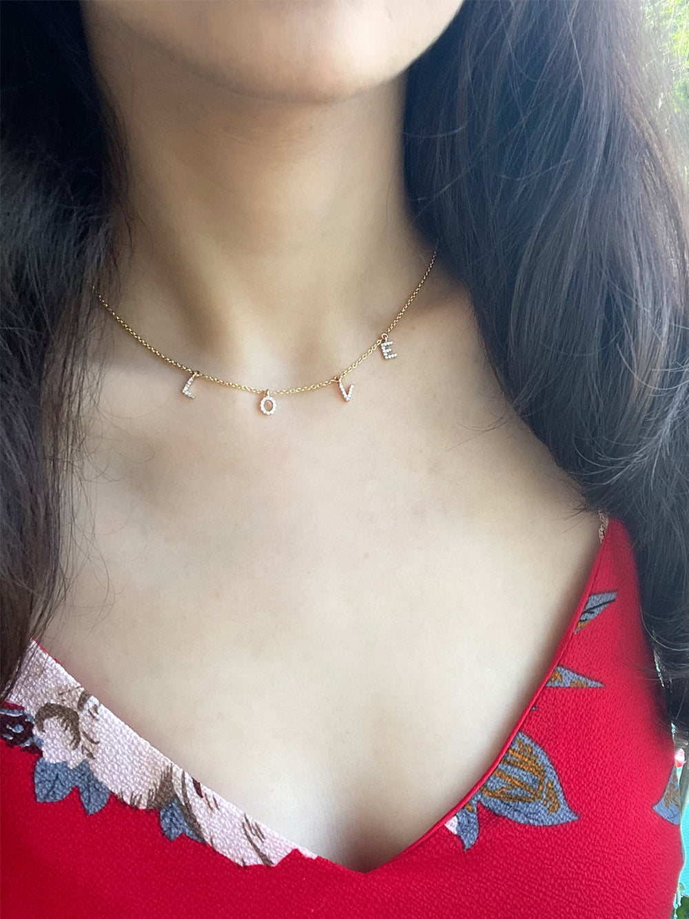 Dangling Love necklace with a heart-shaped charm, perfect for women’s romantic and everyday wear-1